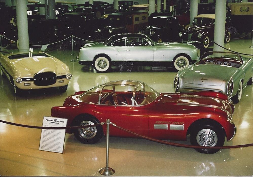 1954 Dodge Firearrow Ghia Roadster (yellow), 1954 Pontiac Bonneville Special (bronze) 1955 Falcon Ghia (blue) and the 1953 Chrysler Ghia Thomas Special (green) on display at the Cleveland Auto & Aviation Museum circa 1993